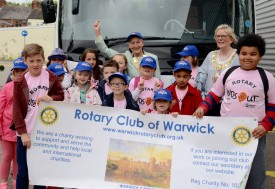 The Mayor of Warwick and the President of Warwick Rotary Club see the children off for their day out