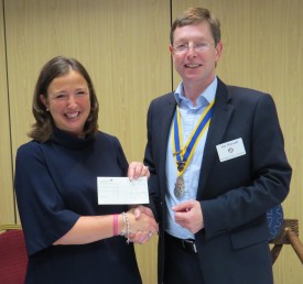 Rachel Ollerenshaw receives her cheque from Jon Wassall