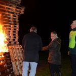 The Mayor Warwick lights the bonfire