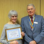 Joan is pictured with Rotary President, John Taylor