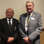 Om Gurung with Rotary President John Taylor.