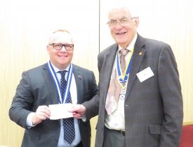 Michael Vallance receives a cheque from club President, John Hibben